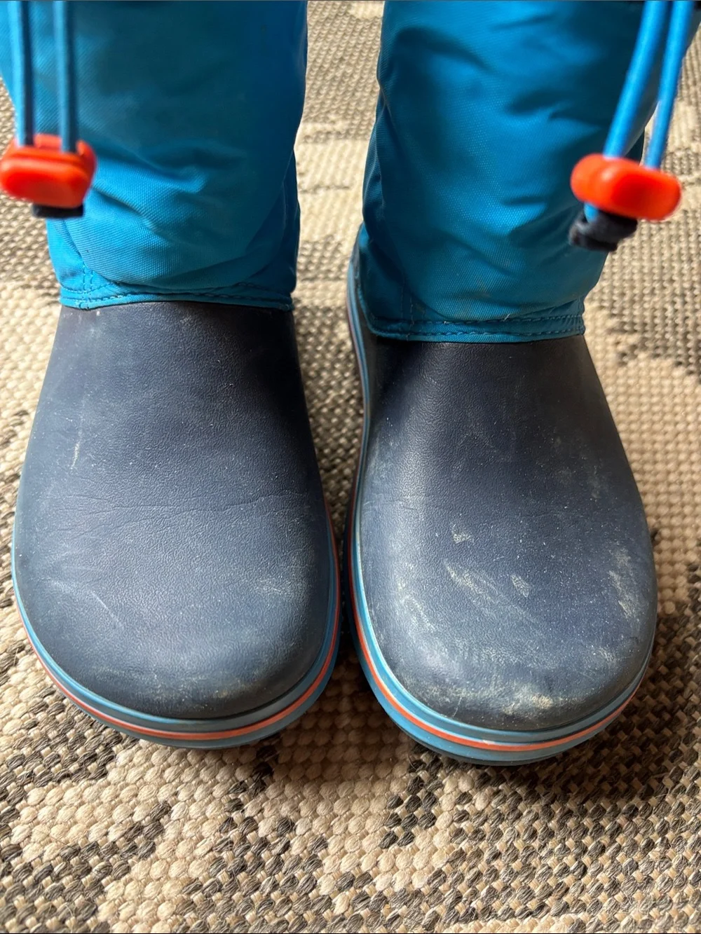 CROCS Kids Navy and Bright Blue Winter Boots with Orange Toggles